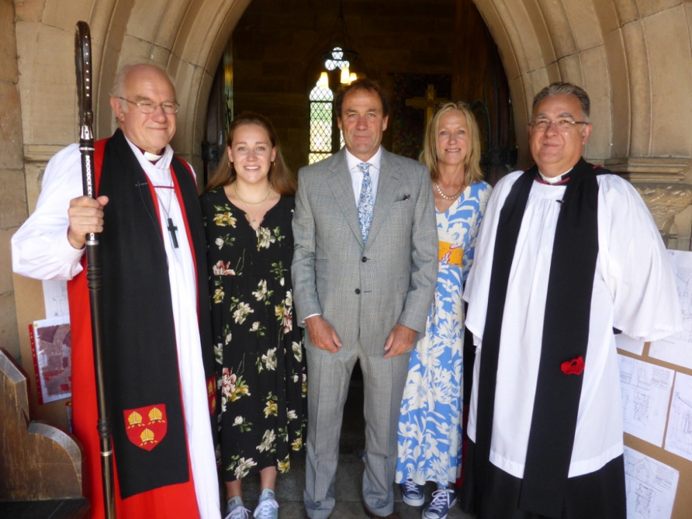 Bishop Peter, Revd Peter Mackriell, Mr Charles Tomkinson (great great grandson of the churchâ€™s benefactor), with his wife and daughter.